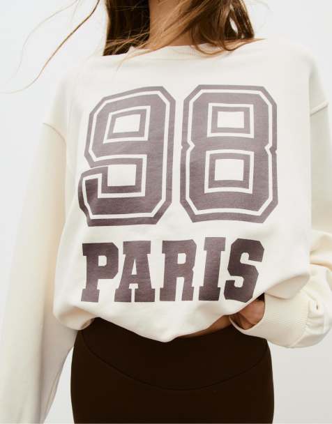 Stradivarius – Sweatshirt in Ecru mit Puffärmeln und Placement-Print - view 1