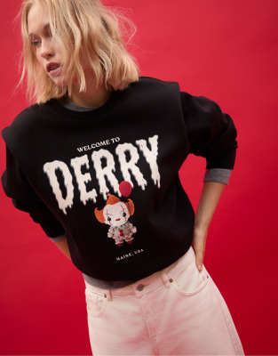 Stradivarius - Sweatshirt in Schwarz mit Schulterpolstern und „ES"-Grafik