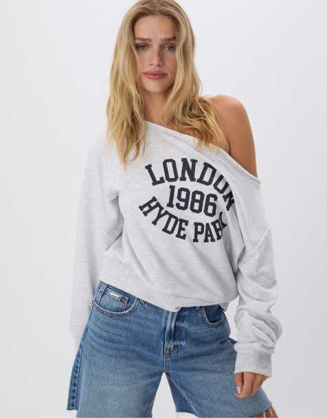 Stradivarius - Sweatshirt met blote schouder en grafische print in gemêleerd grijs - view 1