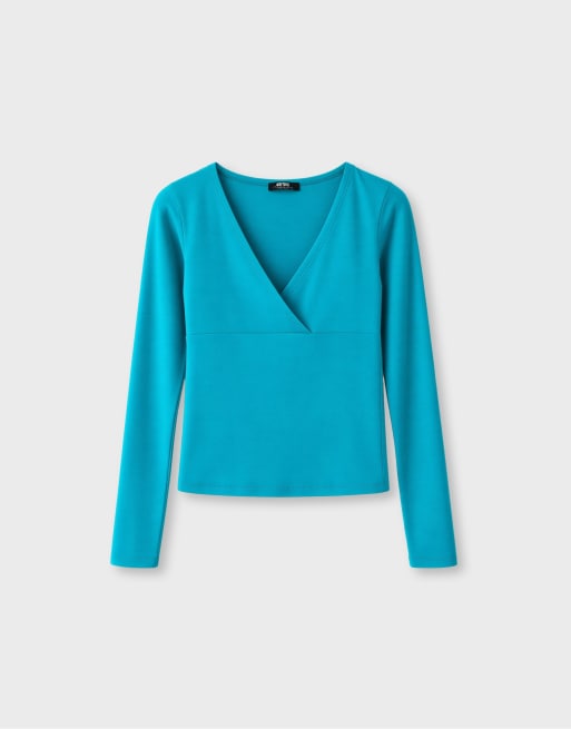 Stradivarius t-shirt à manches longues avec découpe sous la poitrine en turquoise, 6 de 7