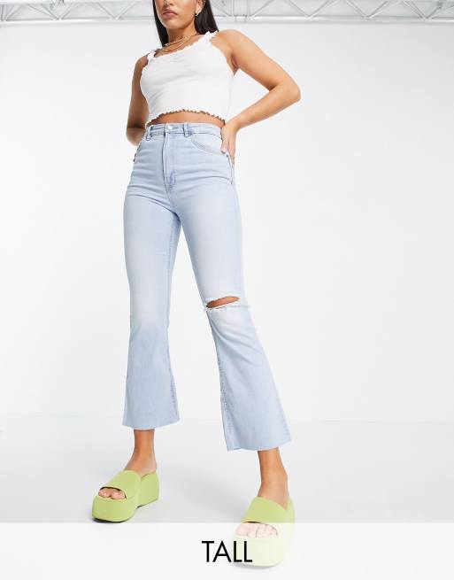 Stradivarius Tall stretch flare jeans with split detail in light blue -  ShopStyle