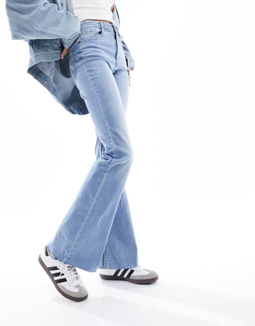 Stradivarius Tall flare jeans with split in light wash blue