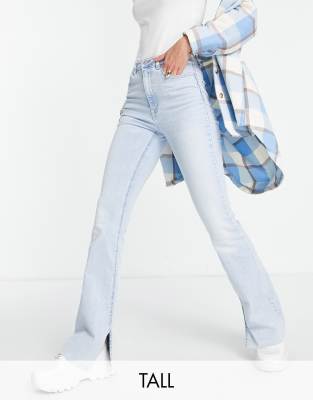 Stradivarius Tall - Flared jeans met stretch en split in lichtblauw | ASOS