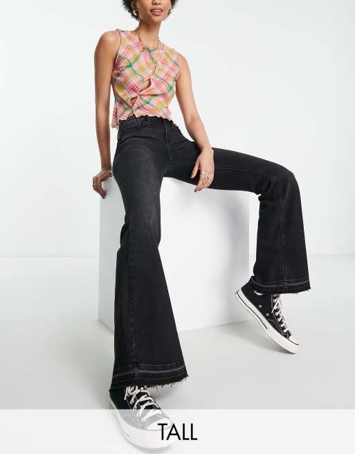 Stradivarius Tall - Jeans a zampa a vita bassa neri