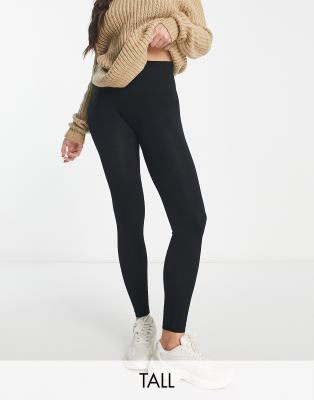 Stradivarius Tall seamless ribbed leggings in black, £15.99