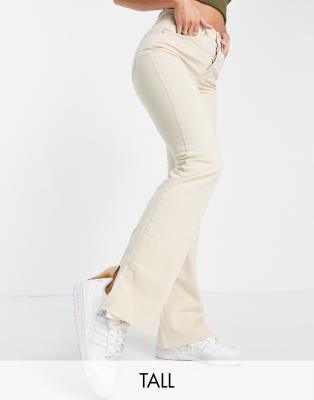 Stradivarius Tall slim flare jean with split detail in ecru - ASOS Price Checker