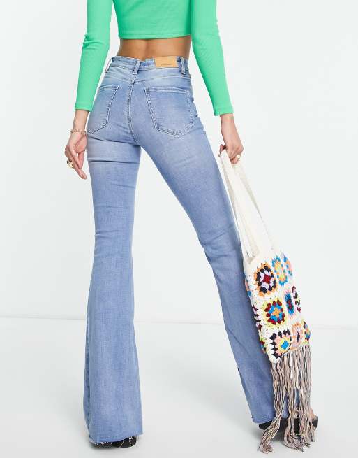 Stradivarius Tall stretch flare jeans with split detail in medium blue