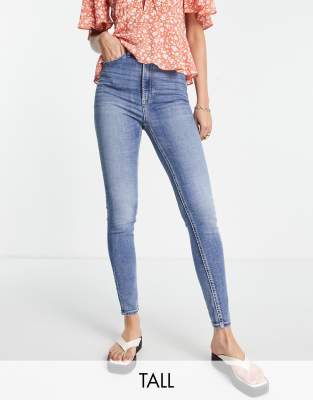 Weekday Twig mid rise v-shape waist straight leg stretch jeans in light  verona blue