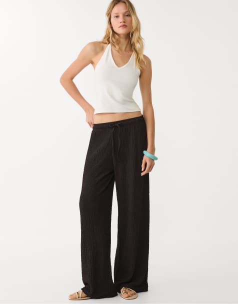 Stradivarius textured trousers in black - view 1