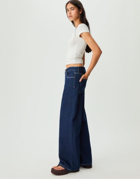 Stradivarius – Tief sitzende, weite Jeans in blauer Rinse-Waschung - view 1