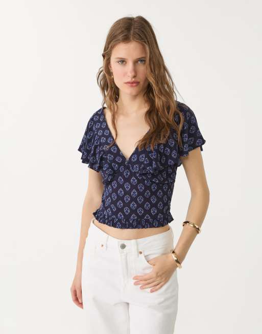 Stradivarius - Top a maniche corte blu con volant