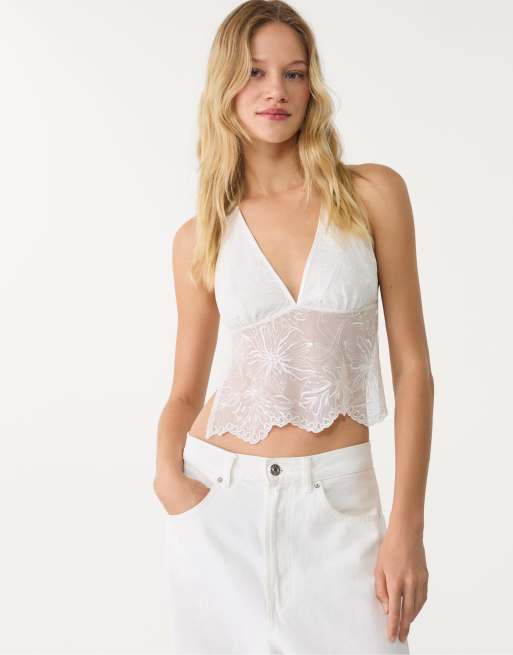Stradivarius - Top allacciato al collo écru con ricamo e stress