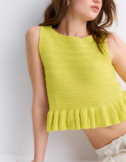 Stradivarius - Top peplo in maglia color oro