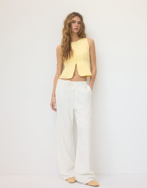 Stradivarius - Top senza maniche color oro con bottoni