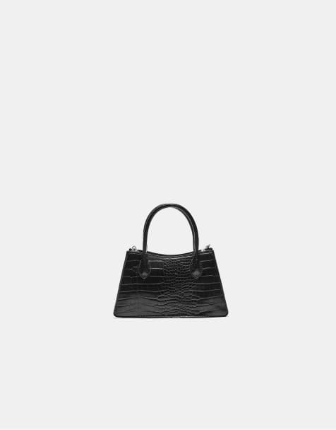 Stradivarius Trapeze shoulder bag with coconut effect in black - view 1