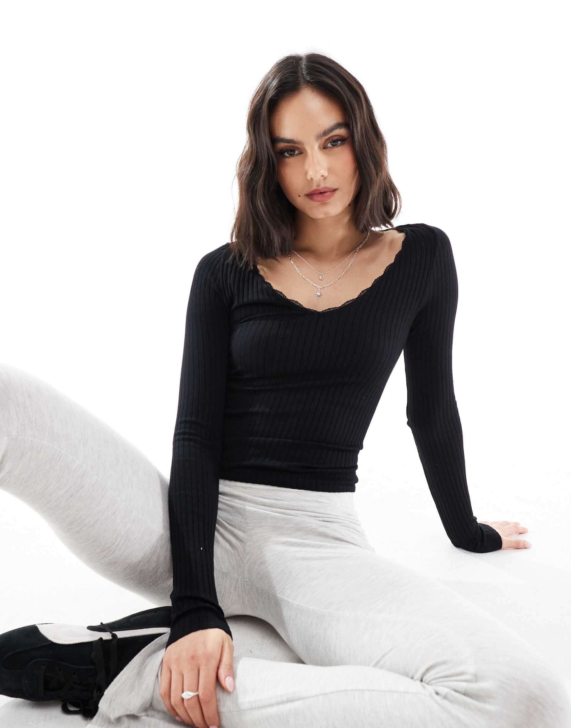 stradivarius v neck long sleeve jersey top in black