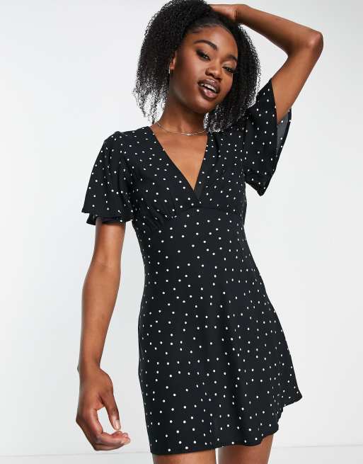 Stradivarius v neck tea dress in black and white spot print | ASOS