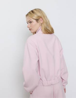 Stradivarius - Veste à col montant et manches bouffantes - Rose saumon