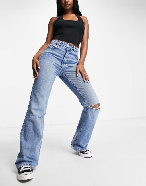 Simuler etc Scully Stradivarius vintage flare jeans in medium blue | ASOS