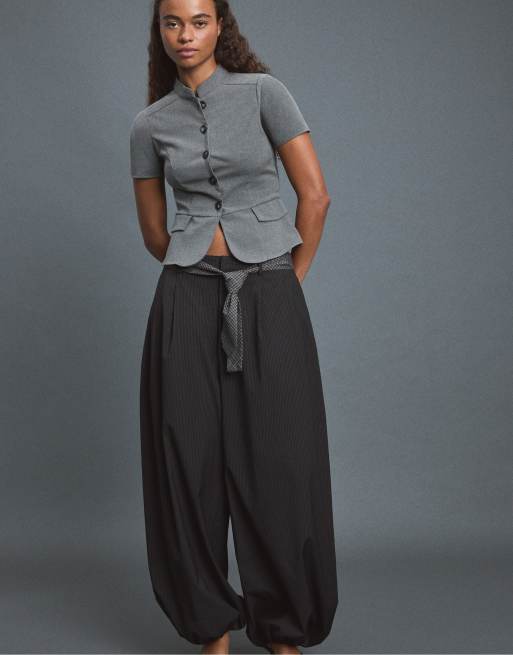 Stradivarius Voluminous tie-detail sarouel trousers in black, 5 of 7