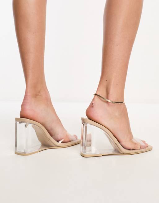 Clear store mule wedges