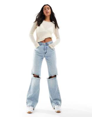 wide leg dad jeans with rips in medium blue