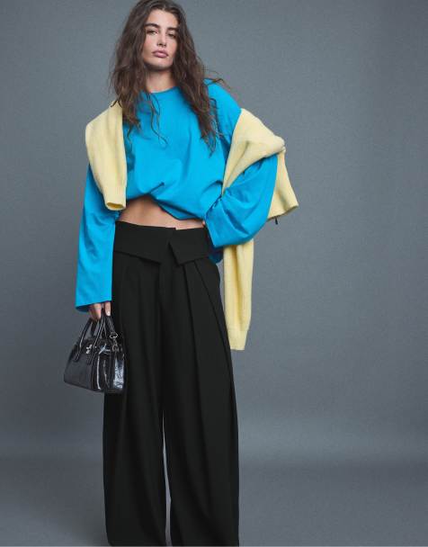 Stradivarius Wide-Leg-Hose mit umgeschlagenem Bund in Schwarz - view 1