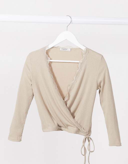 Stradivarius wrap long sleeve top with lace detail in beige | ASOS