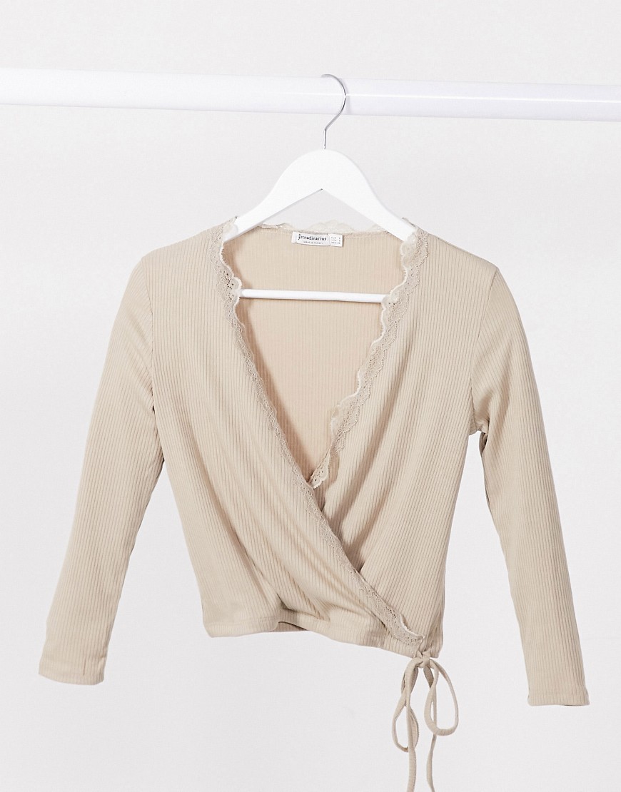 Stradivarius wrap long sleeve top with lace detail in beige-Neutral