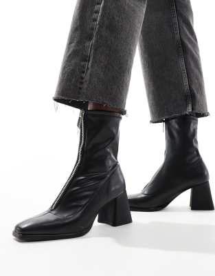 zip front ankle boots in black