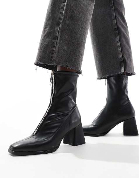 Stradivarius zip front ankle boots in black - view 1