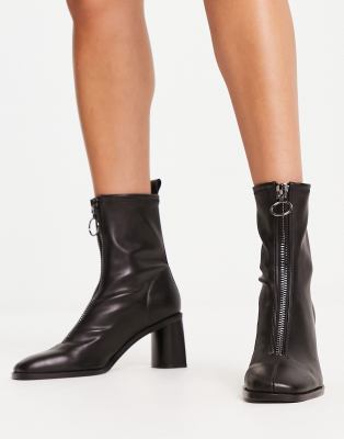 Stradivarius zip front heeled boots in black | ASOS