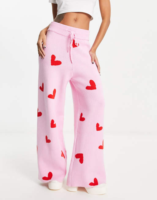 Pink pants store with white hearts