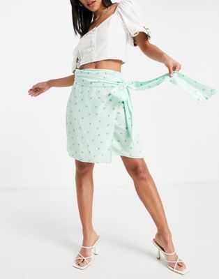 Style Cheat mini wrap skirt co-ord in green heart print