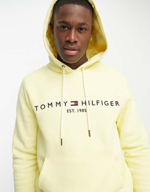 Sudadera amarilla capucha y logo en el centro de Tommy Hilfiger