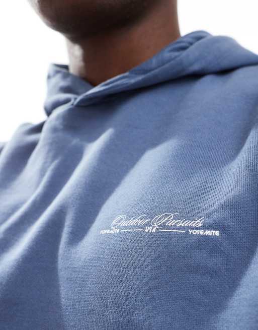 Sudadera azul añil lavado de corte cuadrado con capucha y estampado en relieve de ASOS DESIGN, 4 de 4
