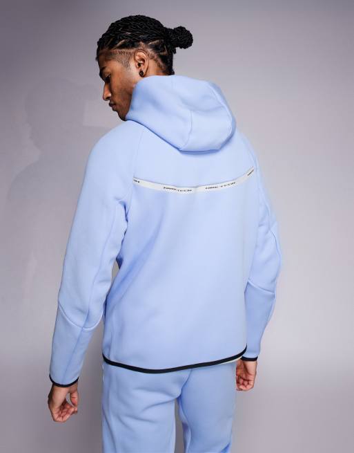 Sudadera azul claro con capucha, cremallera y detalles reflectantes Tech Fleece de Nike, 3 de 5