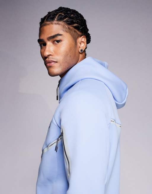 Sudadera azul claro con capucha, cremallera y detalles reflectantes Tech Fleece de Nike, 4 de 5