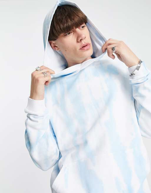 Sudadera azul claro extragrande con capucha, efecto tie dye y estampado de dibujos deportistas de ASOS DESIGN, 3 de 4