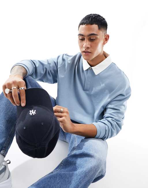 Sudadera azul de estilo rugby con cuello tipo polo de ASOS DESIGN