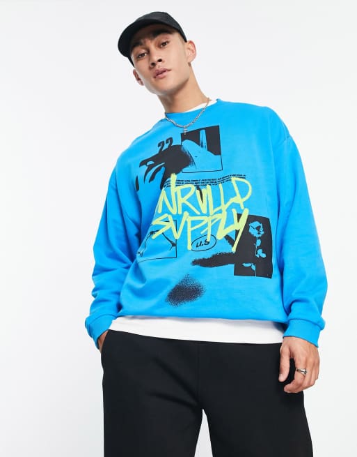 Sudadera azul extragrande con estampado grande gráfico en la parte delantera y logo de ASOS Unrvlld Spply