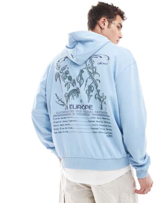 Sudadera azul lavado extragrande con capucha y texto 