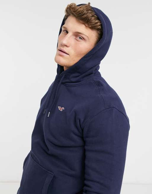 Sudadera azul marino con capucha y logo Icon de Hollister ASOS