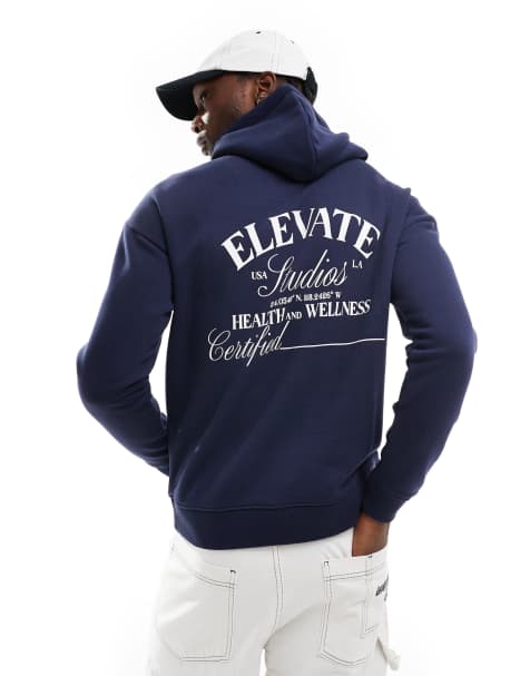 Sudadera azul marino extragrande con capucha y texto "Elevate" de Another Influence - view 1