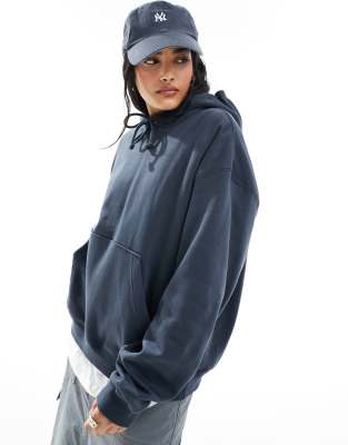 Sudadera azul oscuro con capucha Essence de Weekday 