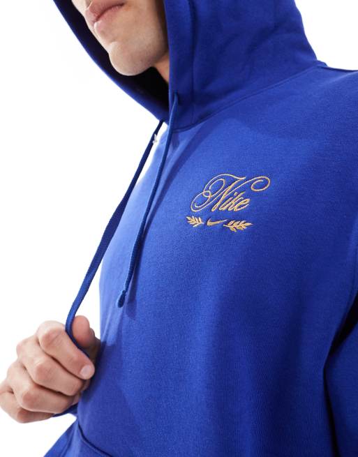 Sudadera azul oscuro con capucha y diseño festivo de Nike Club, 2 de 4