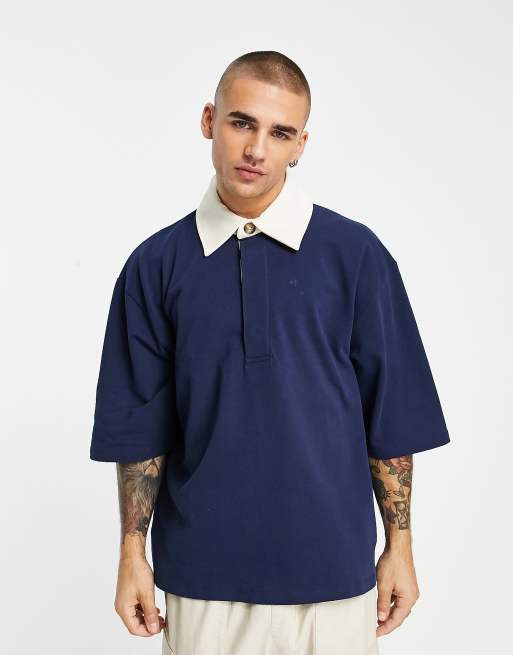 Sudadera azul oscuro ultragrande de manga corta con cuello tipo polo de ASOS DESIGN