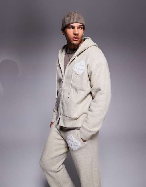 Sudadera beis con capucha, cremallera y emblema de punto mullido de The Couture Club (parte de un conjunto)