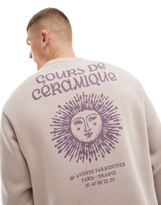 Sudadera beis con cuello redondo y estampado de sol en la espalda de Selected Homme