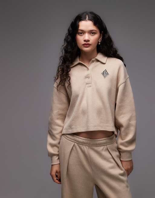 Sudadera beis con cuello tipo polo de Lacoste